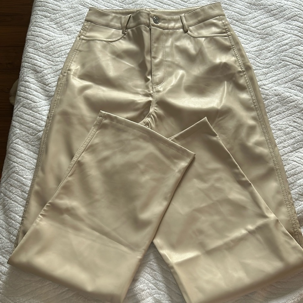 Light coloured garage leather pants